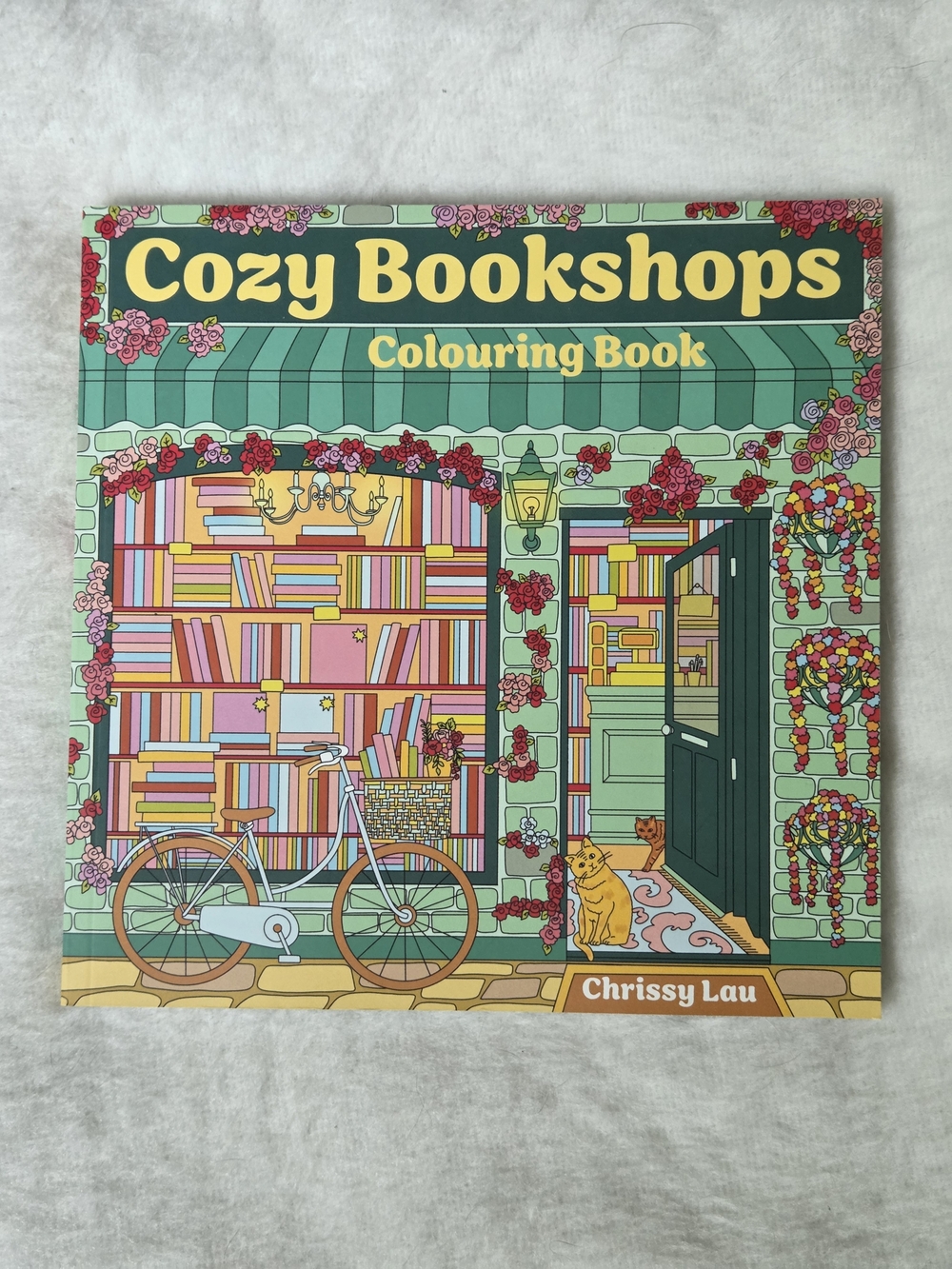 Cozy Bookshops Colouring Book by Chrissy Lau cute cats and books